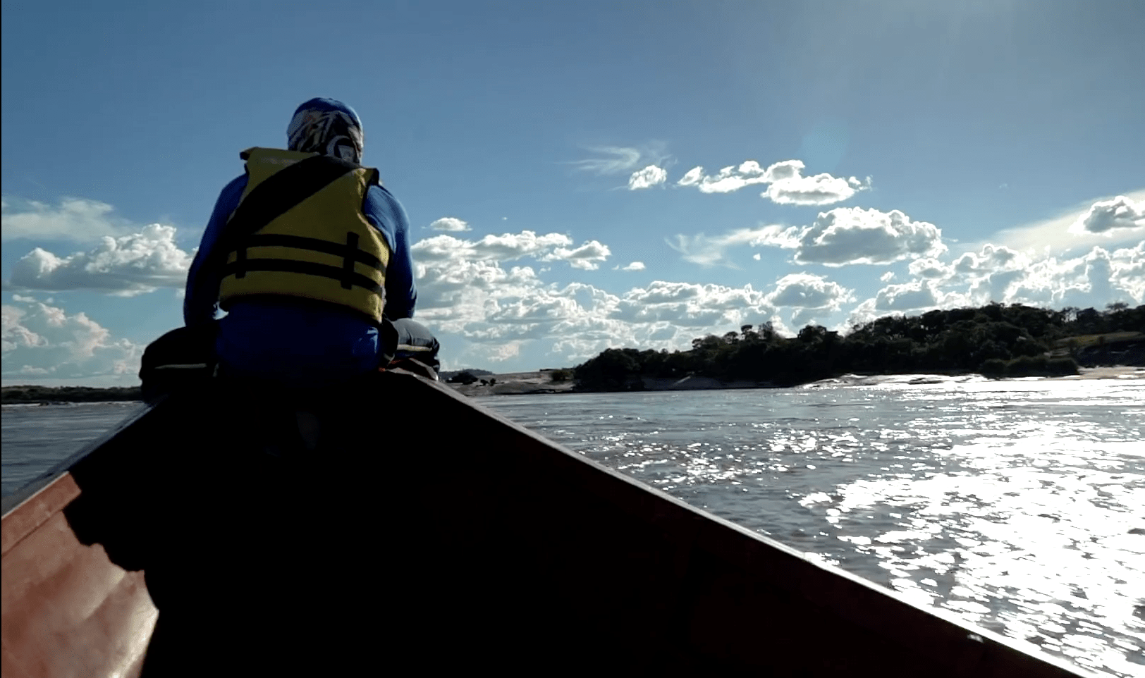 Boat landscape with a person in front of the boat